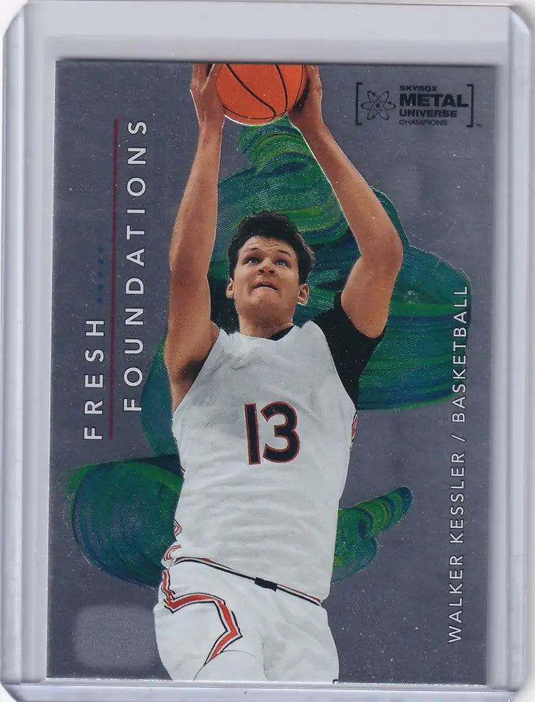 Basketball trading card of Walker Kessler in white jersey for Skybox Metal Universe Champions