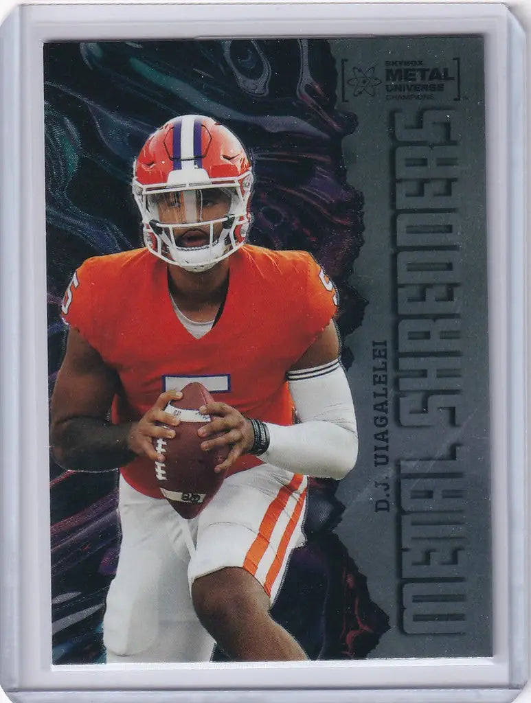 Football trading card of D.J. Uiagalelei in orange jersey, Skybox Metal Universe Champions