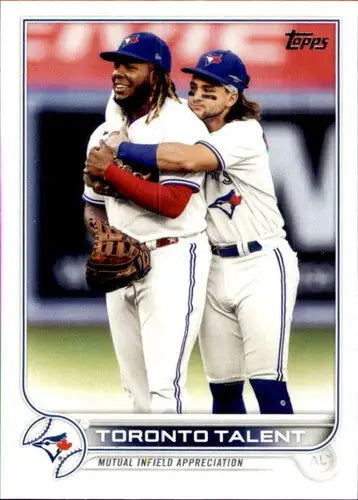 Baseball card featuring two players embracing from 2022 Topps #381 Bichette NM-MT Blue Jays