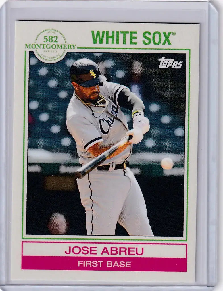 Baseball card of Jose Abreu Chicago White Sox player swinging a bat in 2022 Topps set