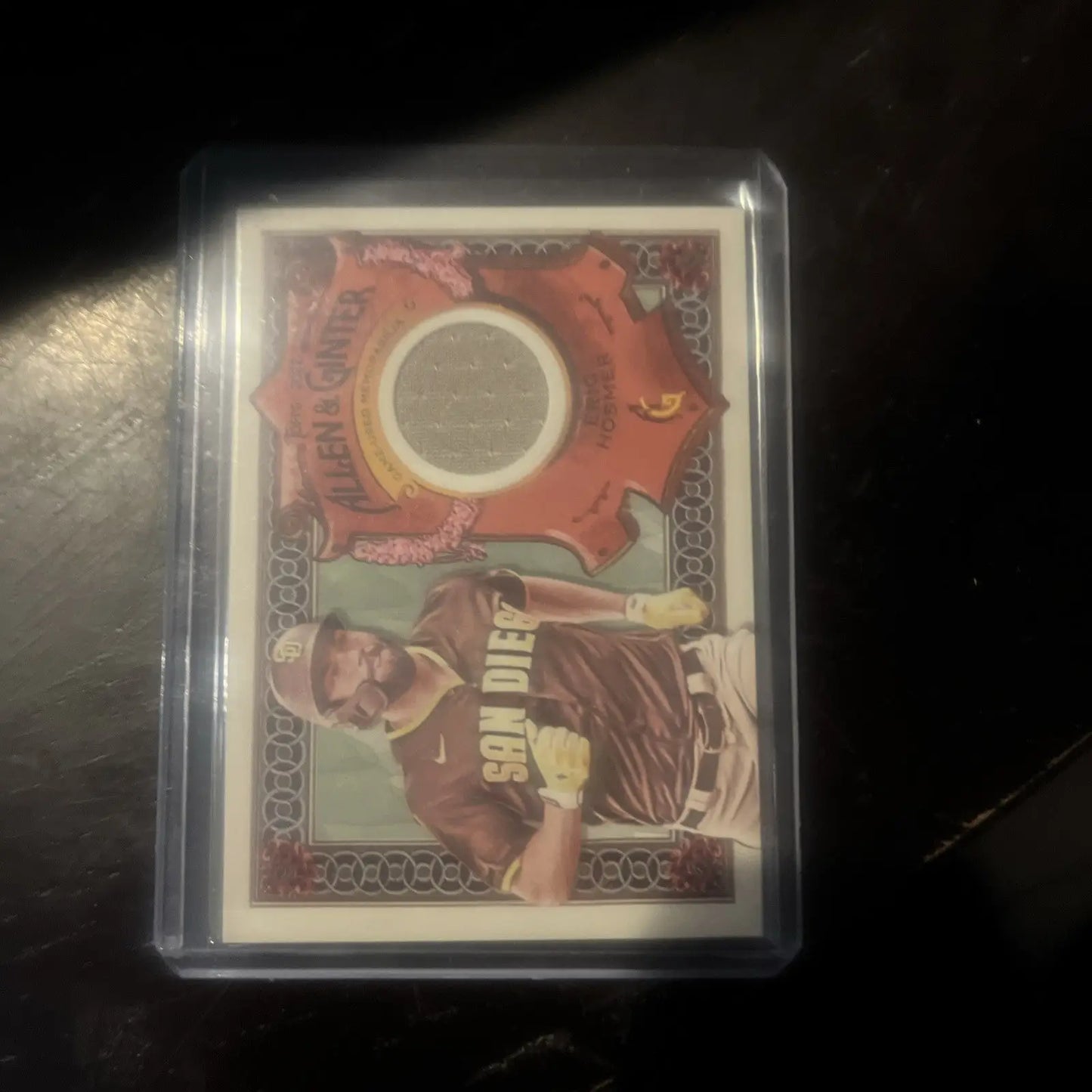 Framed baseball card of 2022 Topps Allen & Ginter Eric Homer, San Diego Padres game used patch