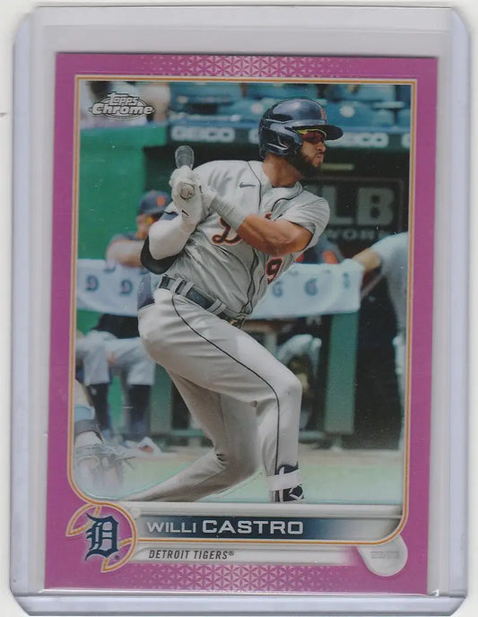 Baseball card of Willi Castro swinging bat from 2022 Topps Chrome Pink Detroit Tigers