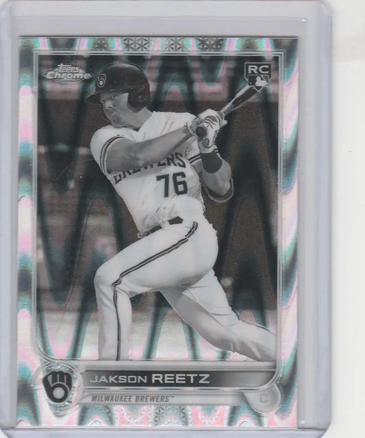 Baseball card of Jackson Reetz mid-swing in Topps Chrome Raywave for Milwaukee Brewers