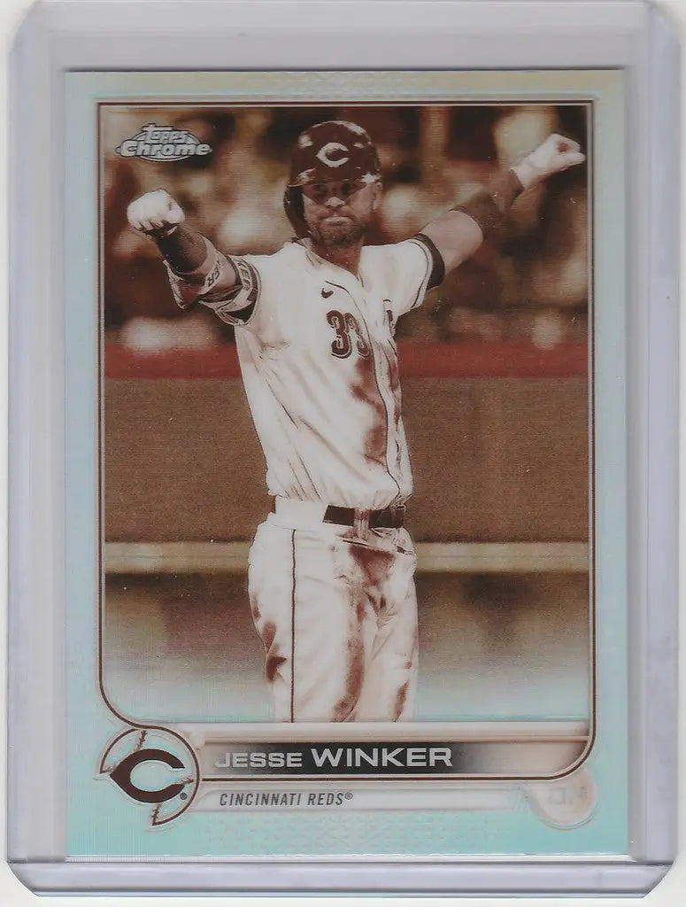Baseball card of Jesse Winker in throwing motion from Topps Chrome Sepia collection
