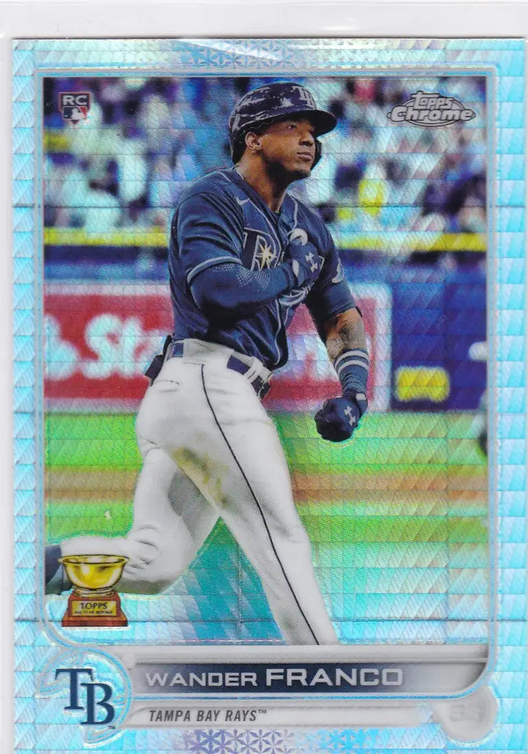 Baseball card of Wander Franco RC, Tampa Bay Rays player in Topps Chrome navy uniform