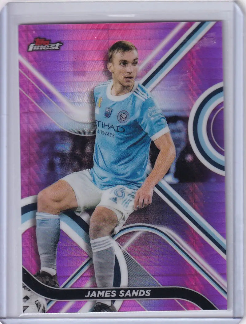 Pink and purple Topps Finest Pink trading card of NYCFC player James Sands in light blue uniform