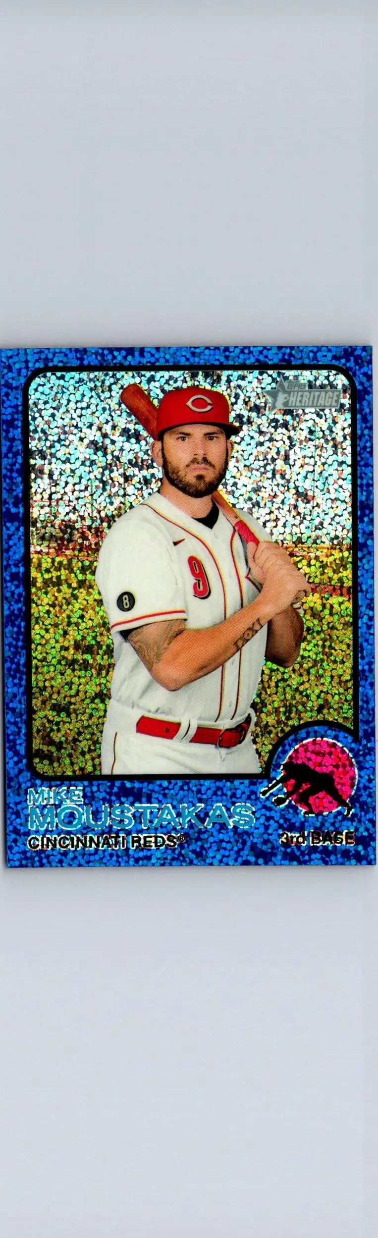 Blue baseball card of Mike Moustakas from 2022 Topps Heritage Chrome Blue Sparkle
