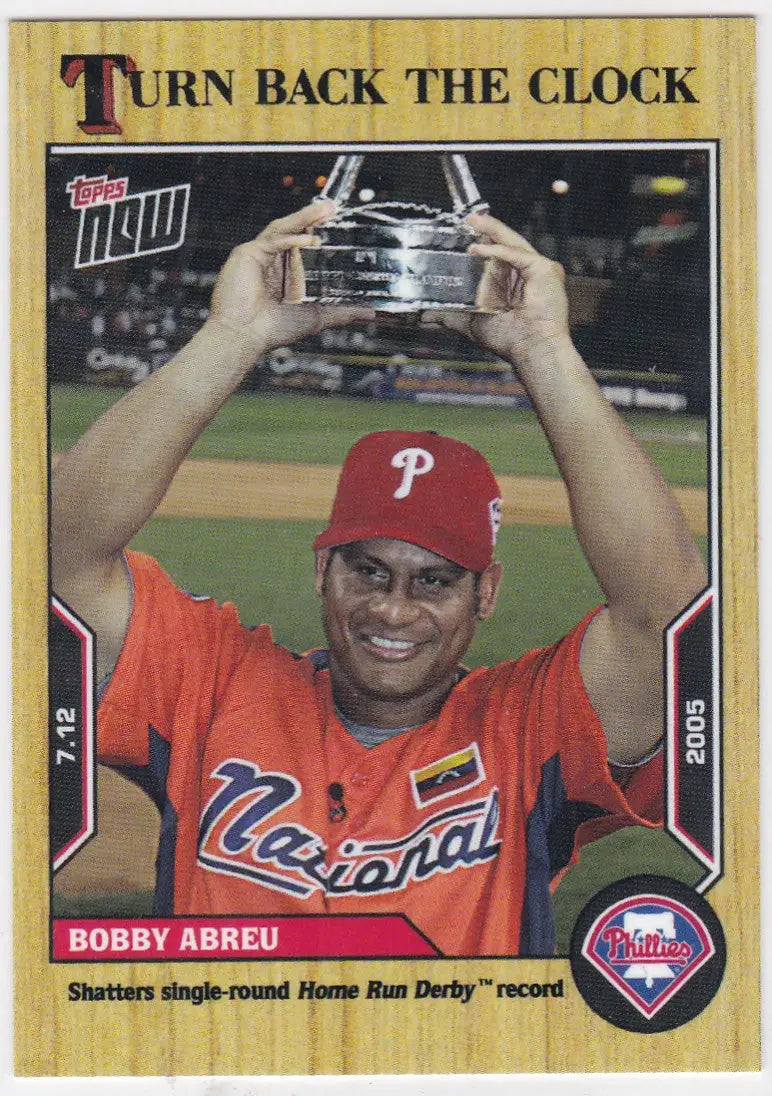Baseball trading card of Bobby Abreu Philadelphia Phillies holding a trophy