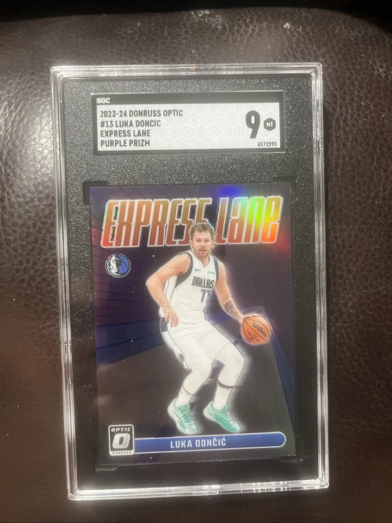 Graded Luka Dončić trading card from 2023-24 Panini Donruss Optic Express Lane Purple Prizm