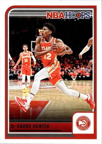 2023-24 Panini Hoops De’Andre Hunter basketball card with original gloss Hawks ID 68432