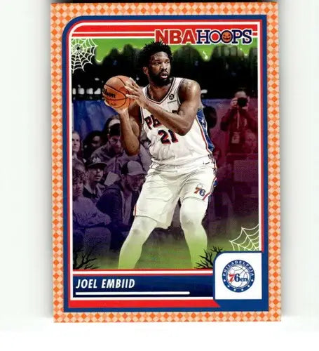 Joel Embiid basketball card from 2023-24 Panini Hoops Haunted Orange series
