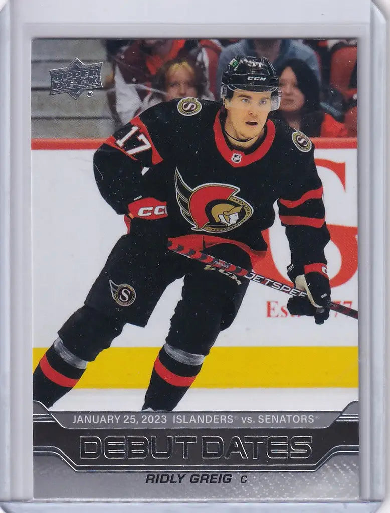 Hockey trading card of Ridly Greig from Upper Deck Series 1 Ottawa Senators in action