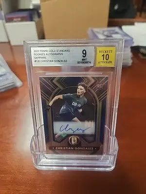 Graded Christian Gonzalez rookie autograph card showcasing rookies autograph sapphire from 2023 Gold Standard