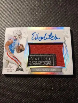 2023 Leaf Trinity - Patch Auto Eli Holstein #PA-EH1/99. NRMT+ - Football Card Single