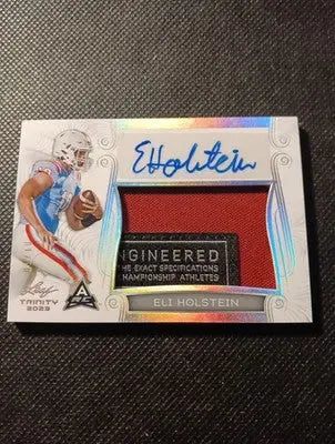 2023 Leaf Trinity - Patch Auto Eli Holstein #PA-EH1/99. NRMT+ - Football Card Single