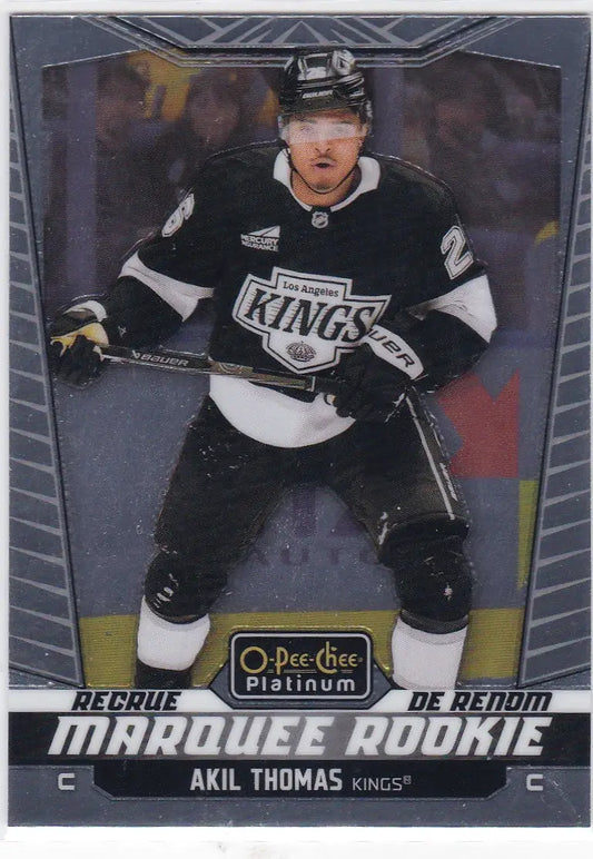 Black and white Los Angeles Kings Akil Thomas platinum marquee rookie trading card