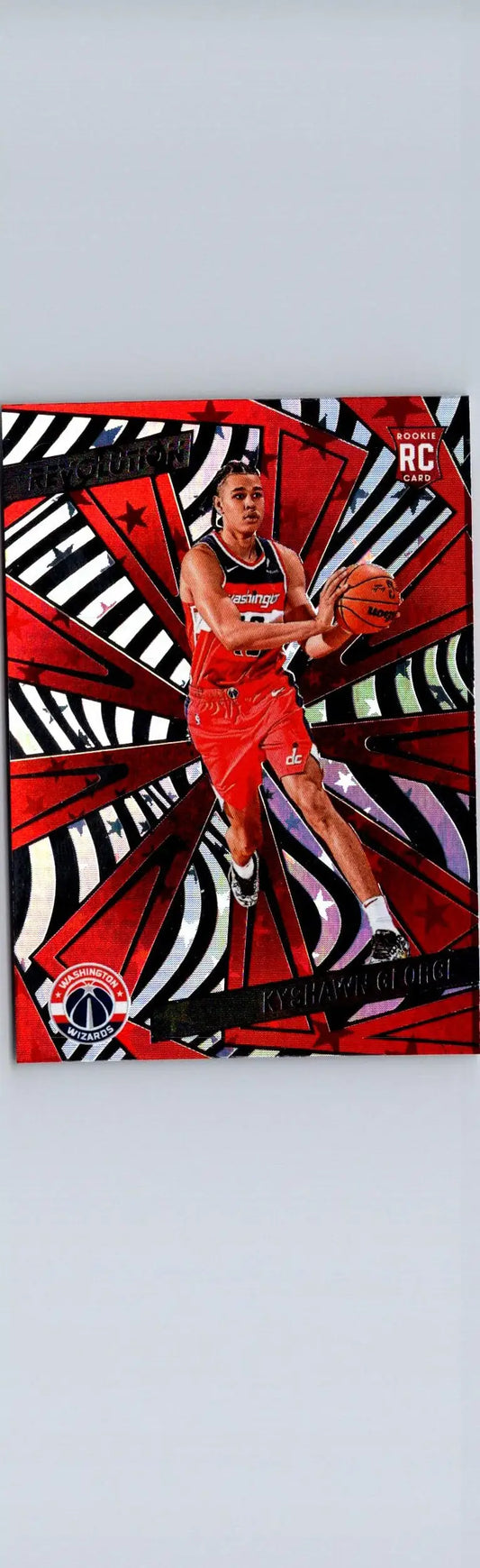 Basketball trading card featuring Kyshawn George in red uniform with Panini Revolution background