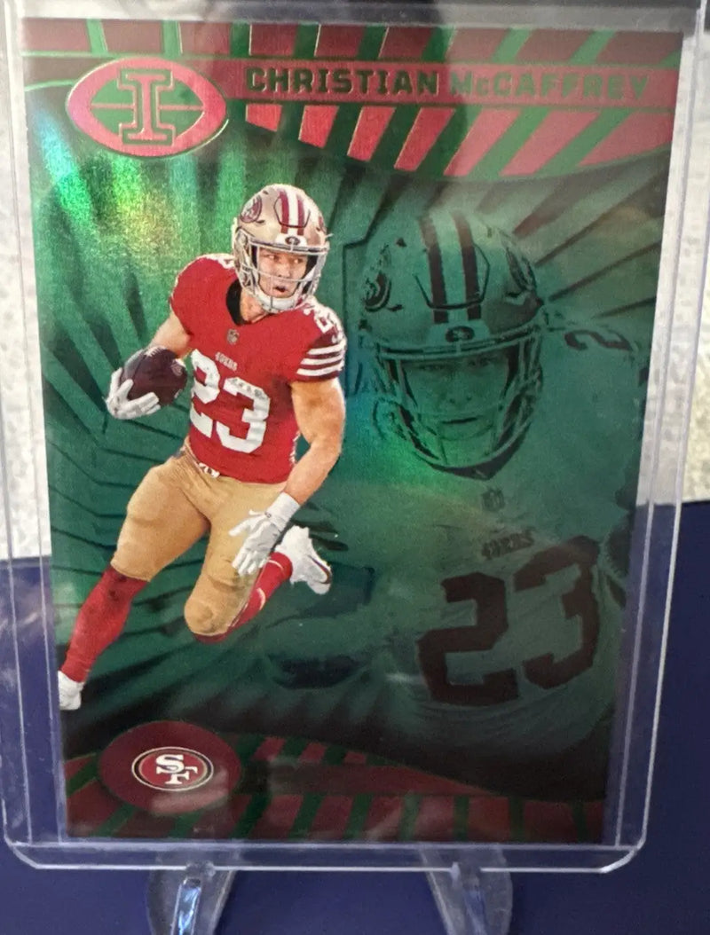 Christian McCaffrey football trading card in protective case from 2024 Illusions Emerald Green 49ers lot
