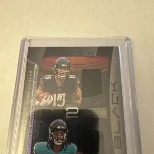 Trading card featuring Black Rome Odunze and Brian Thomas Jr. from Panini Black 2024