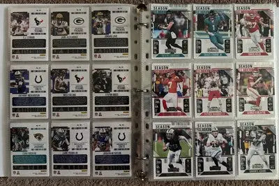 Binder filled with Panini Contenders Football collectible cards from the complete set