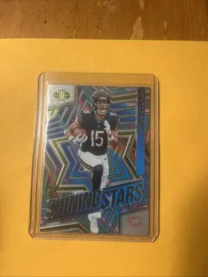 Football trading card of Rome Odunze from Panini Illusions Shining Stars series