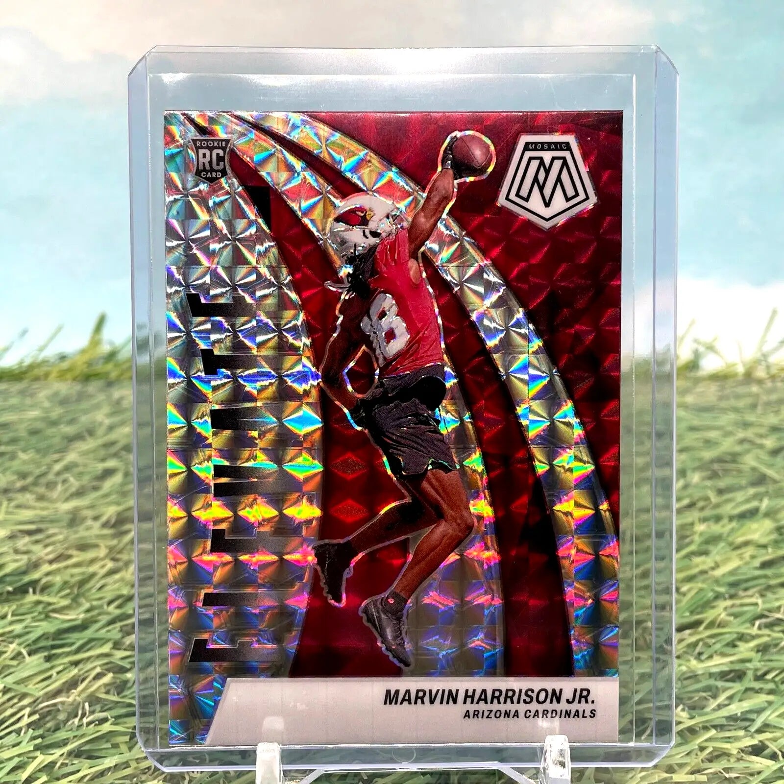 Shiny red Mosaic Marvin Harrison trading card in a dynamic jumping pose