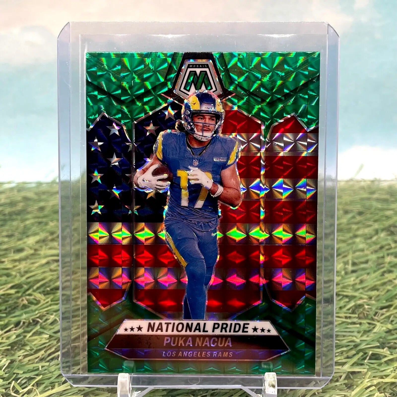 Green Mosaic Prizm football trading card featuring Puka Nacua, Los Angeles Rams player