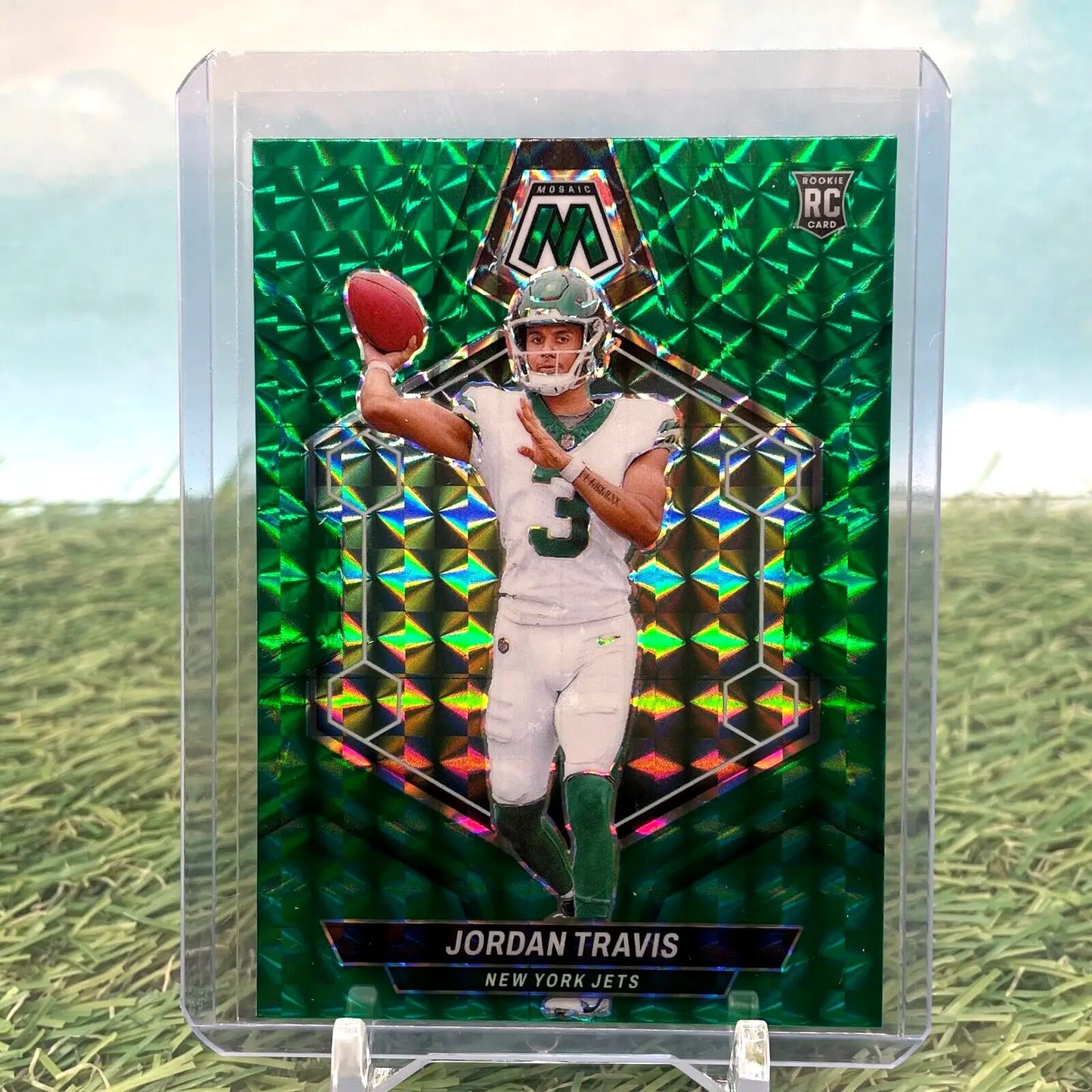 Green Prizm Panini Mosaic NFL rookie card of Jordan Travis in New York Jets uniform