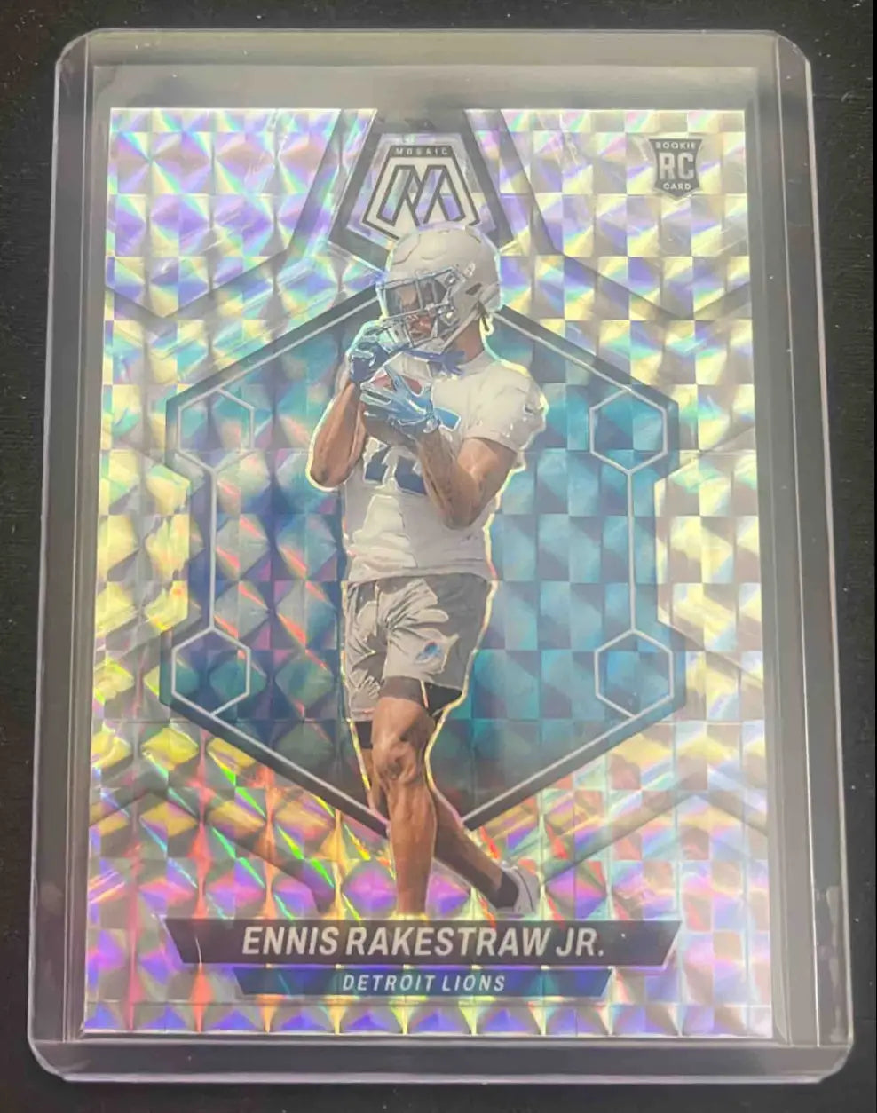 Football trading card of Ennis Rakestraw Jr. from Panini Mosiac Silver Prizm series