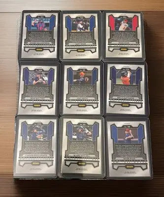 Baseball trading cards in protective sleeves from 2024 Panini Prizm Baseball Pink Ice Prizm Lot
