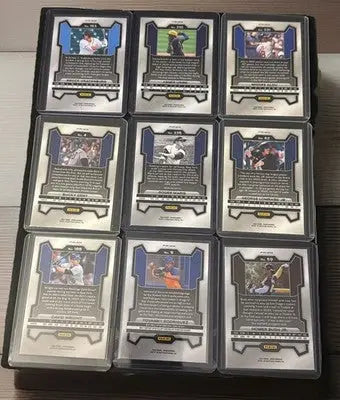 Nine Panini Prizm Baseball Pink Ice Prizm trading cards in protective cases