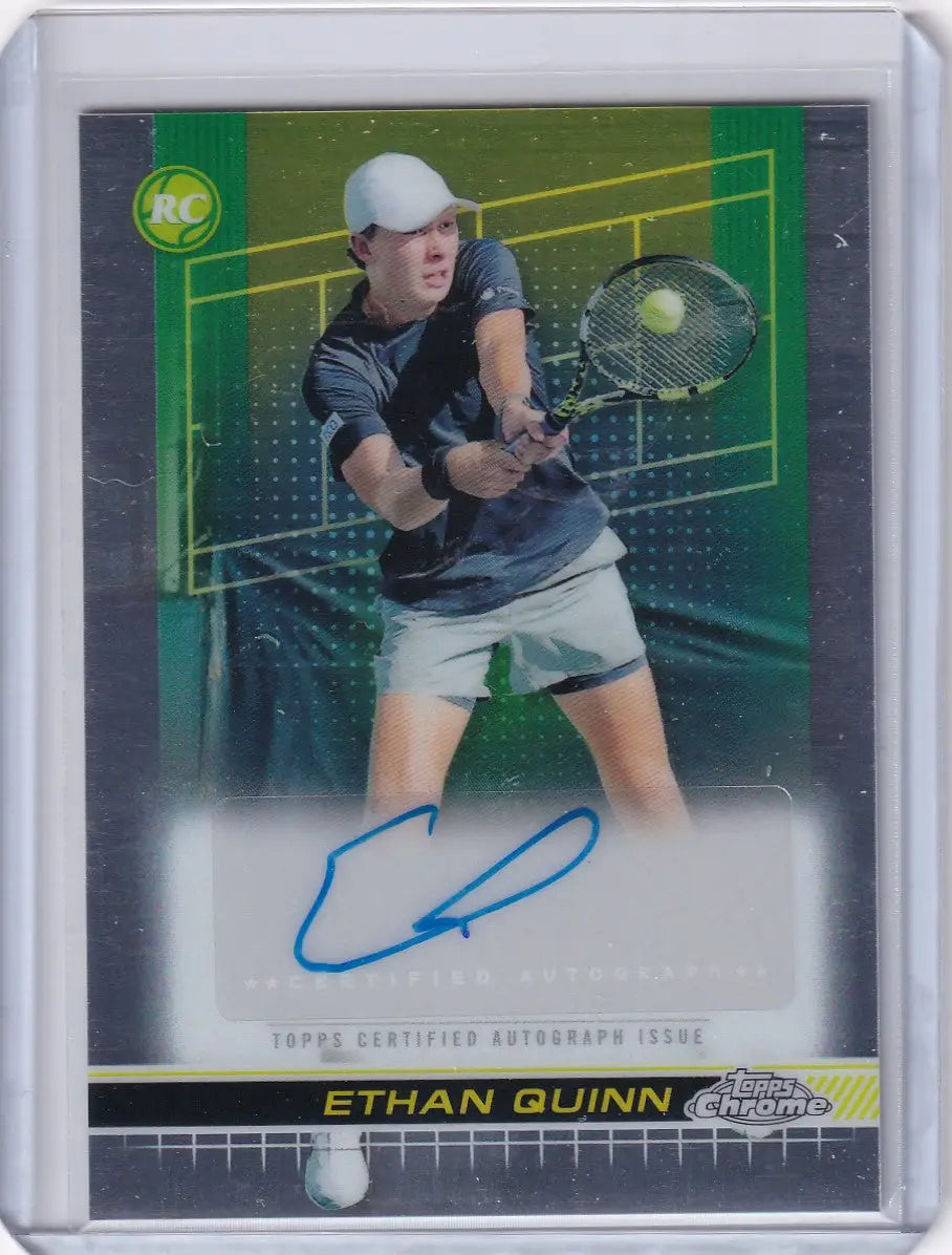 Signed Topps Chrome Auto of Ethan Quinn hitting a backhand shot in a white hat