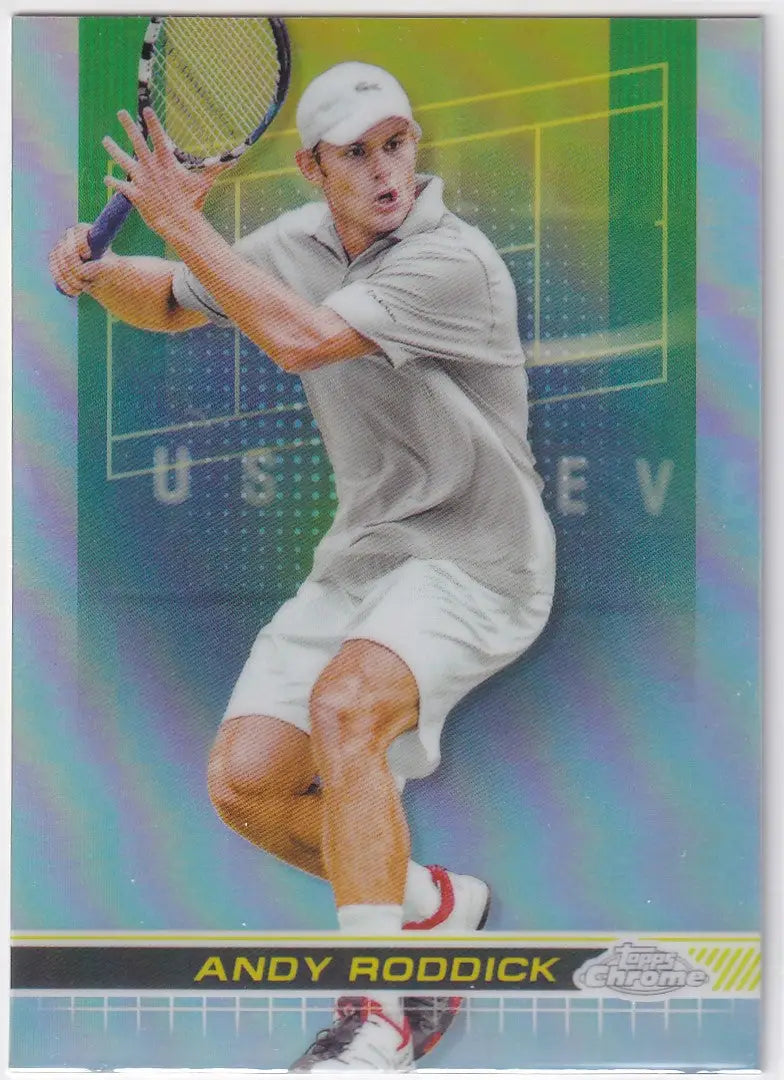 Tennis player in white preparing backhand shot in 2024 Topps Chrome Refractor card