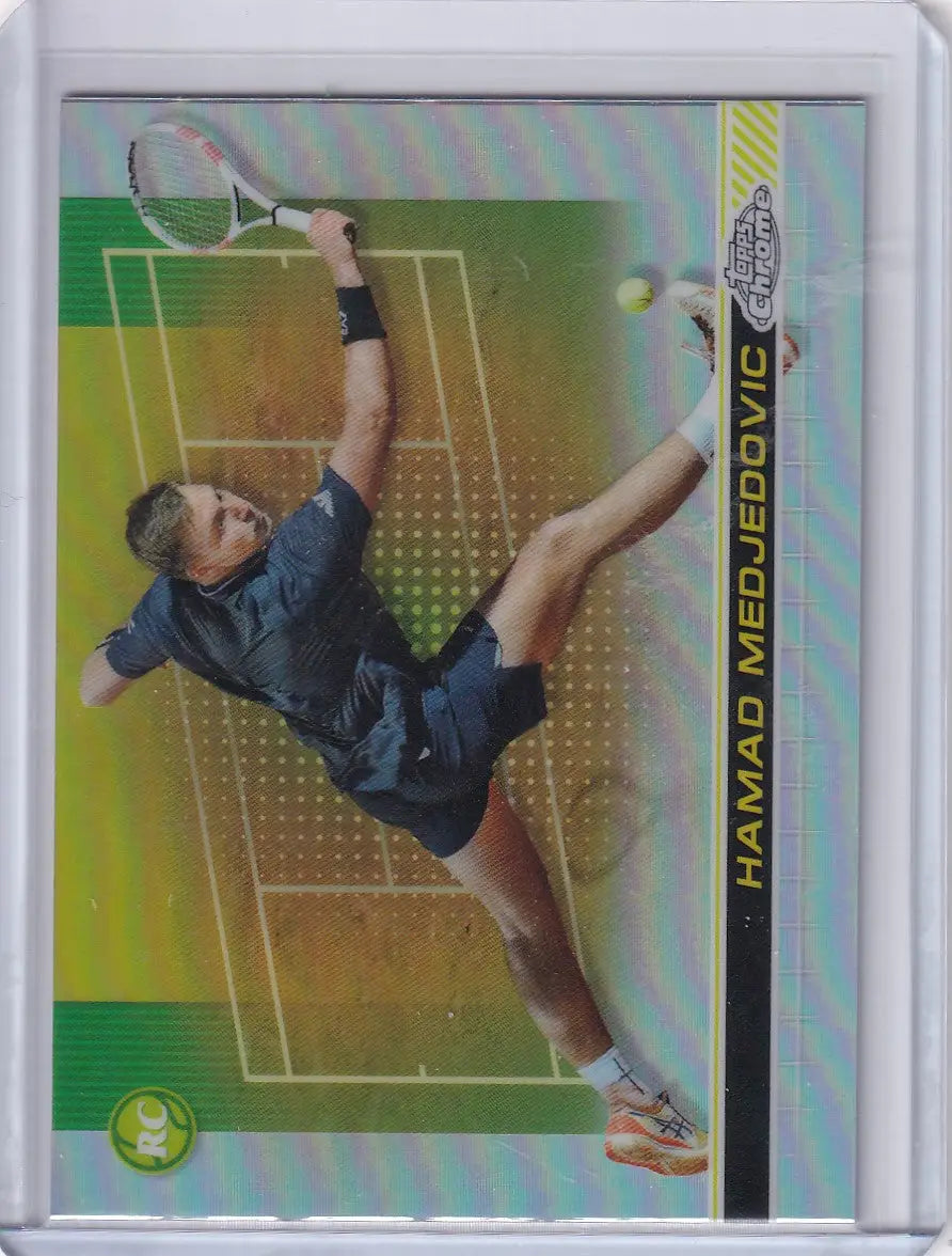 Tennis player stretching to serve on court in Topps Chrome Refractor #106 Hamad Medjedovic