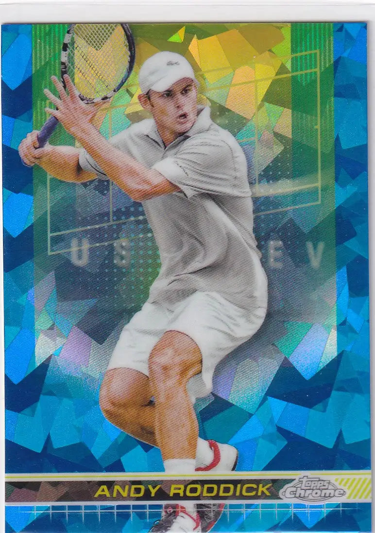 Tennis player in white preparing for backhand shot in Topps Chrome Sapphire card