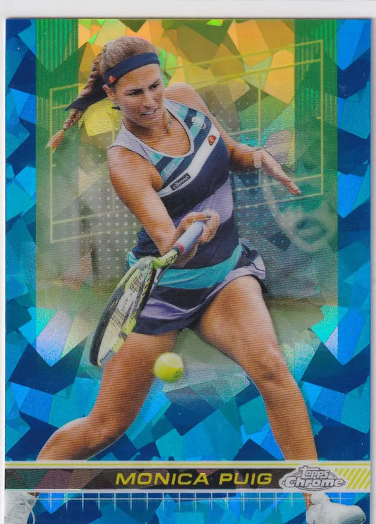 Tennis player in blue and white outfit hitting forehand for Topps Chrome Sapphire card