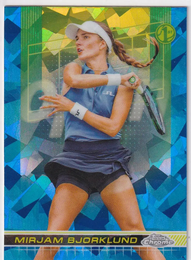 Tennis player in blue top and navy skirt serving in Topps Chrome Sapphire card 176