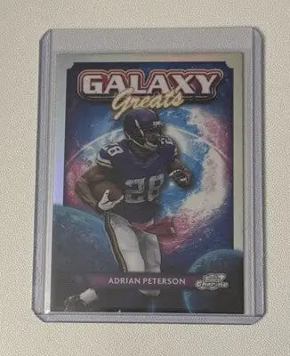 2024 Topps Cosmic Chrome Adrian Peterson and Randy Moss Vikings Galaxy Greats trading cards in protective cases
