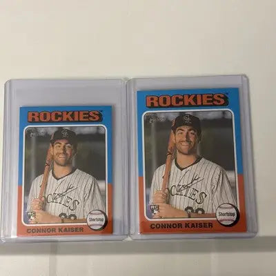 Two Connor Kaiser baseball cards in protective sleeves from 2024 Topps Heritage High Number