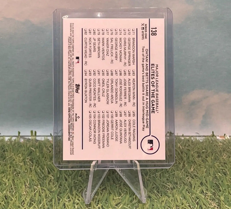 Baseball card in protective case featuring Shohei Ohtani and Mookie Betts from Topps Series 1