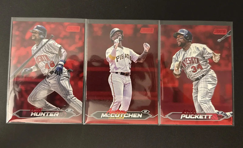 2024 Topps Stadium Club baseball trading cards featuring Torii Hunter, Andrew McCutchen, and Kirby Puckett with red foil background