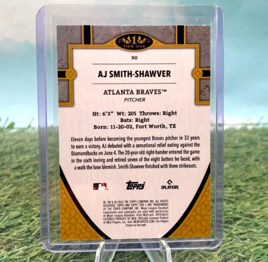 Baseball card in protective case featuring Topps Tier AJ Smith-Shawver Atlanta Braves