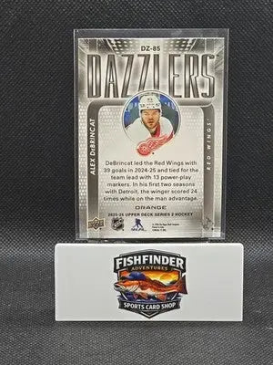 2025-26 Upper Deck Series 2 - Dazzlers Alex DeBrincat #DZ-85 Orange - Hockey Card Single