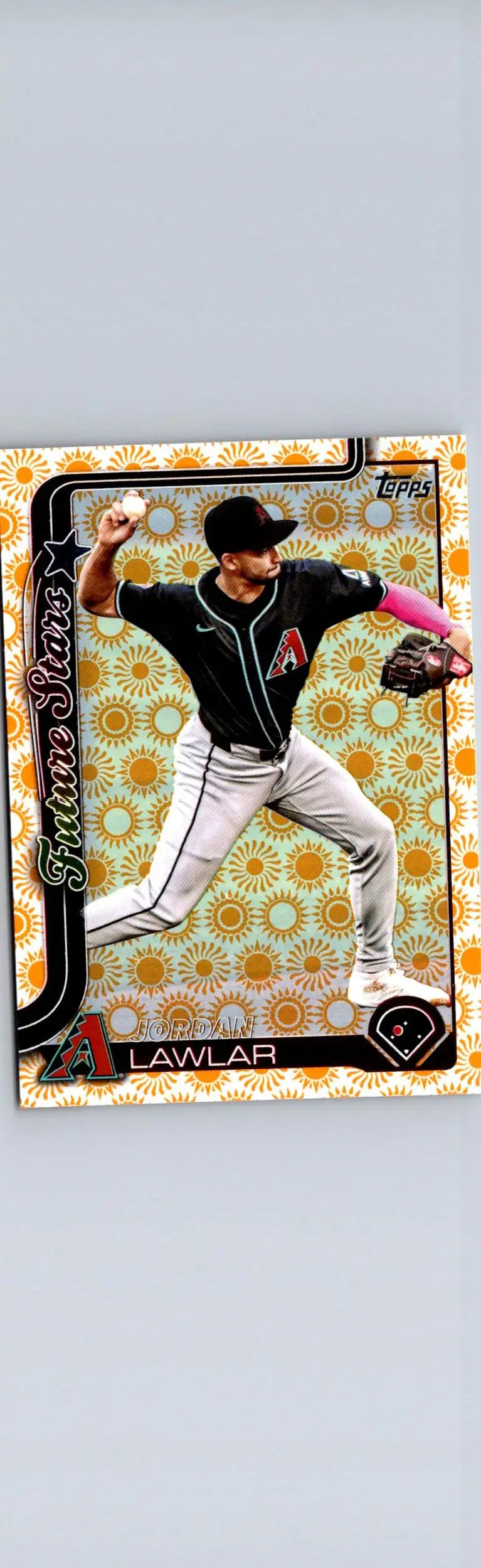 2025 Topps Jordan Lawlar Holiday baseball card featuring player in mid-throw action