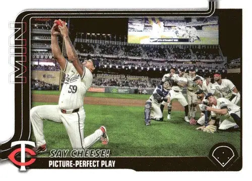Baseball card featuring Carlos Correa reaching for ball and Twins celebration, 2025 Topps NM-MT