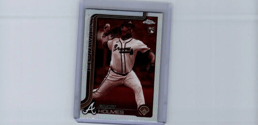 Baseball trading card of Salvador Perez in Braves uniform, encased in sleeve, Perez Sepia Refractors