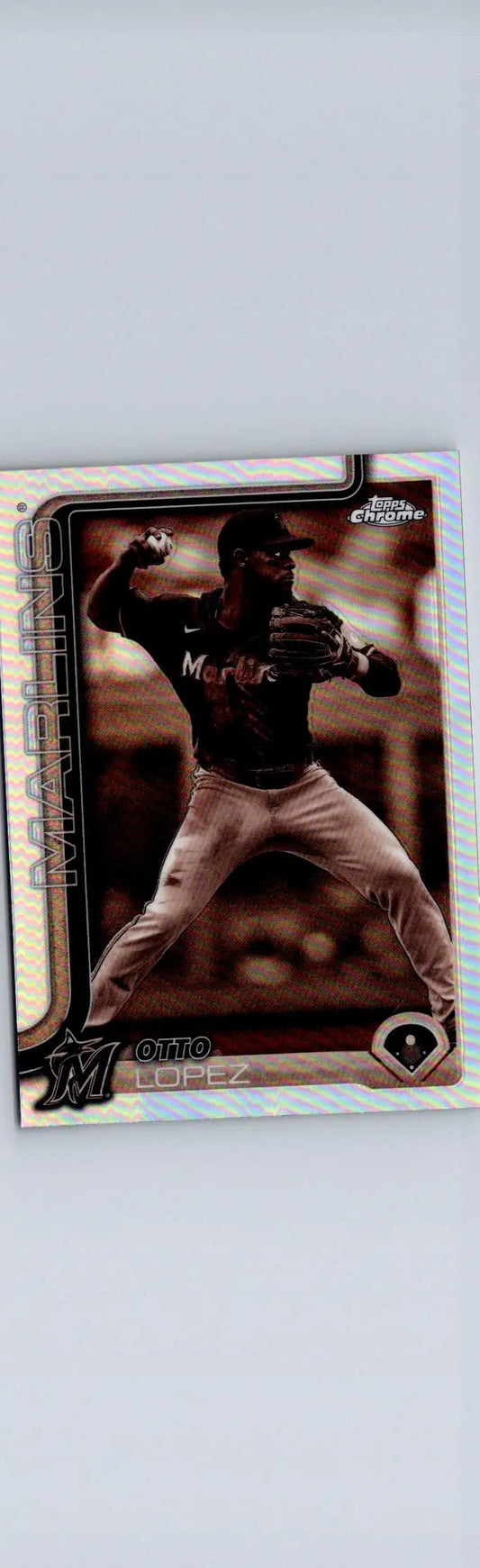 Baseball trading card of Otto Lopez in black Marlins jersey and tan pants, mid-throw