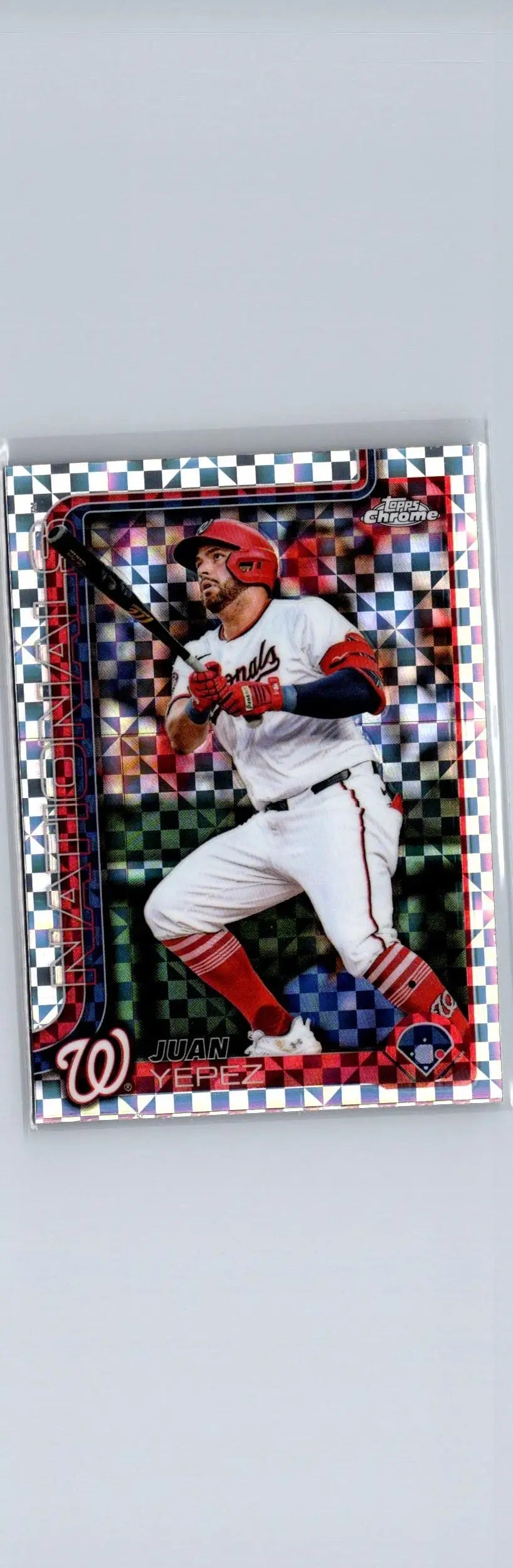 Baseball trading card of Juan Yepez in Topps Chrome with checkerboard background