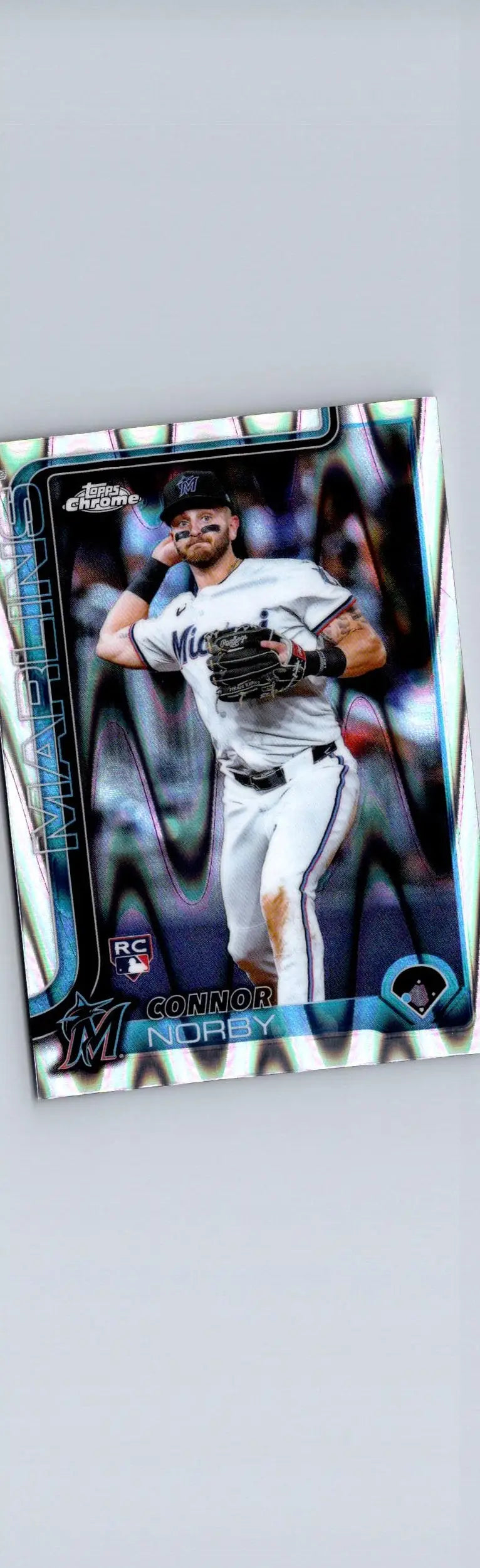 Baseball trading card of Connor Norby Raywave Refractors with white uniform and blue silver border