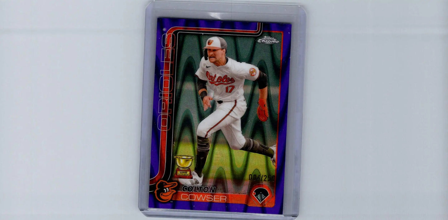 Colton Cowser purple refractors baseball trading card in protective holder featuring running player